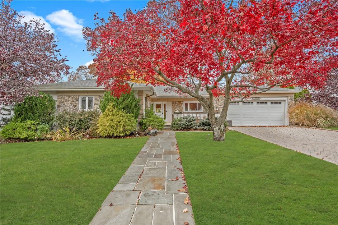 26 Lovell Road New Rochelle, NY 10804 - Photo 1 of 1 a front view of a house with garden
