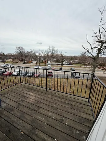 a terrace with a lake view