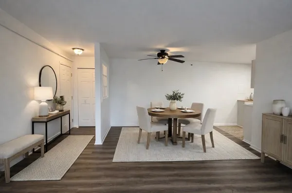 a view of dining room and wooden floor