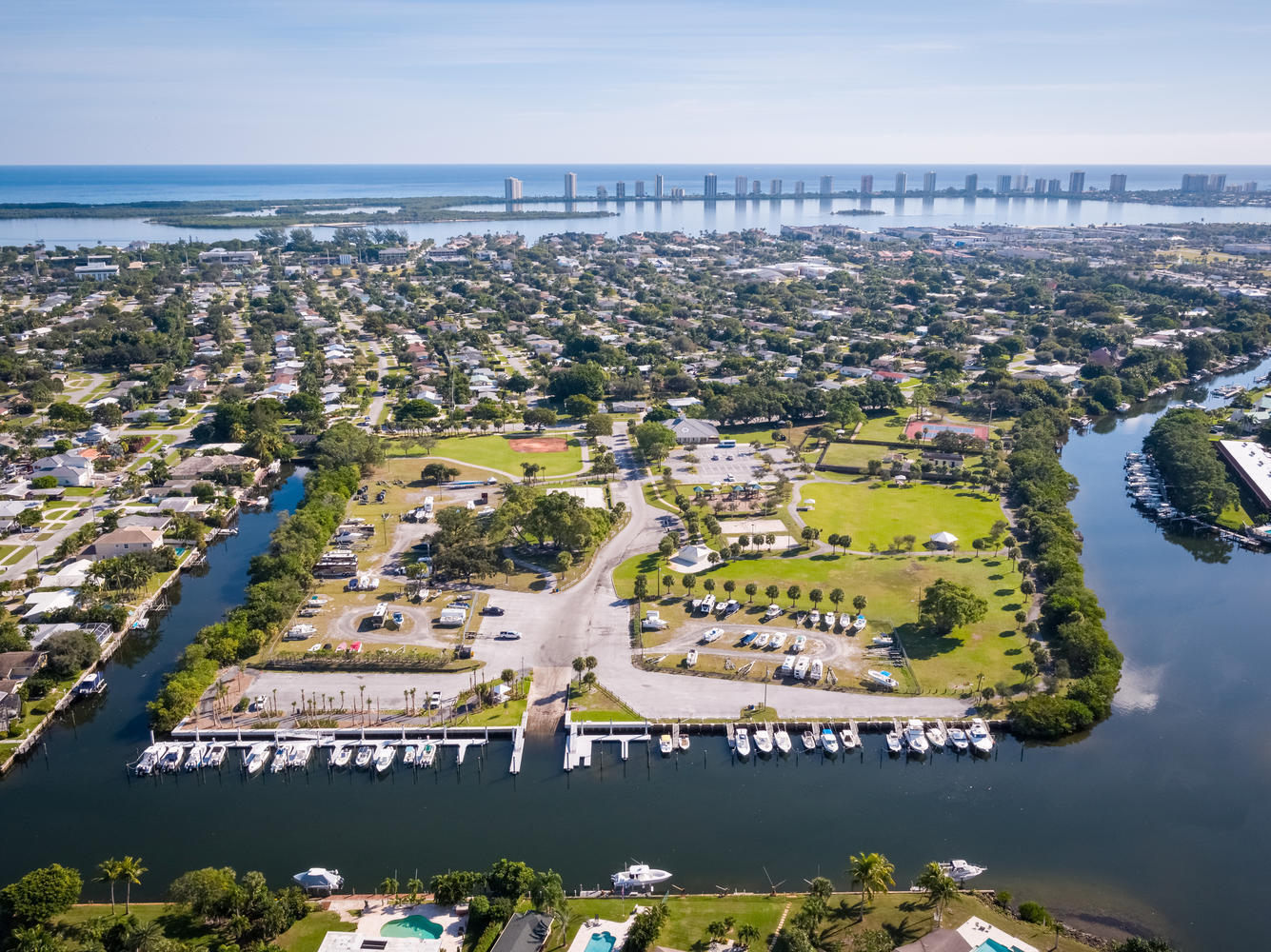 1505 Crescent Circle, Unit A8 Lake Park, FL 33403 - Photo 14 of 32 an aerial view of a residential building and lake view