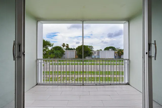 a view of a room that has a window