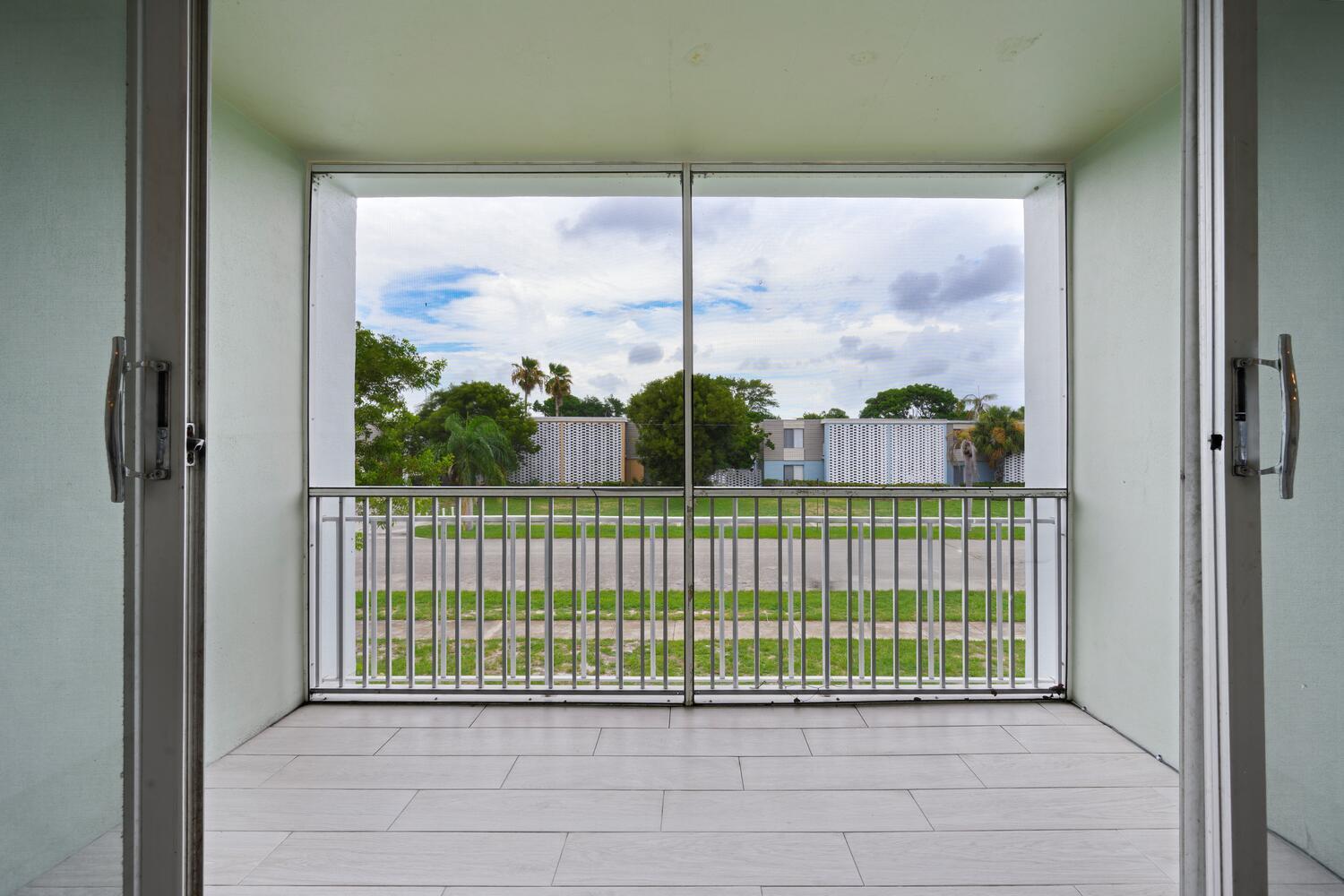 1505 Crescent Circle, Unit A8 Lake Park, FL 33403 - Photo 3 of 32 a view of a room that has a window