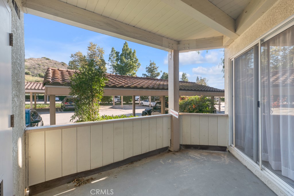 5744 Oak Bend Lane, Unit 203 Oak Park, CA 91377 - Photo 22 of 45 a view of a large window with a view of balcony