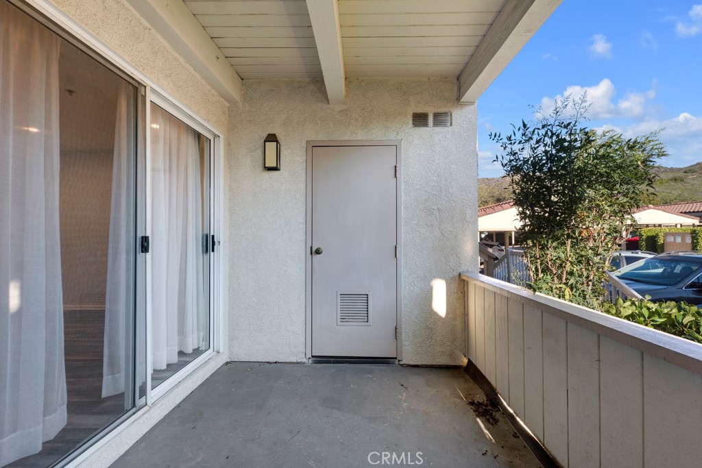 5744 Oak Bend Lane, Unit 203 Oak Park, CA 91377 - Photo 23 of 45 a view of a balcony