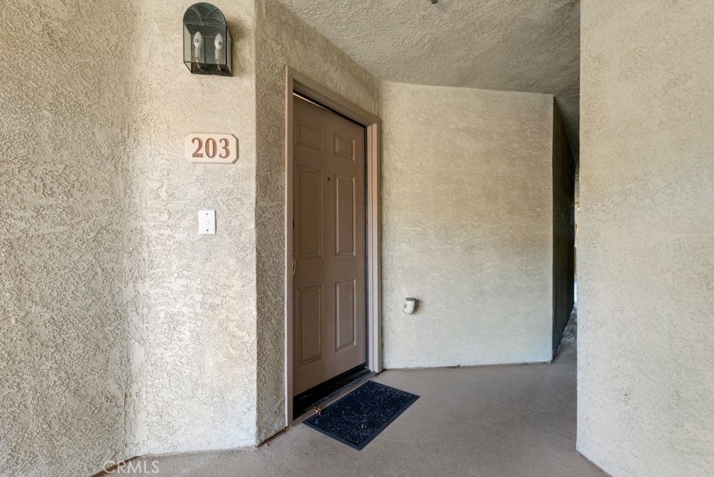 5744 Oak Bend Lane, Unit 203 Oak Park, CA 91377 - Photo 26 of 45 a view of an front door