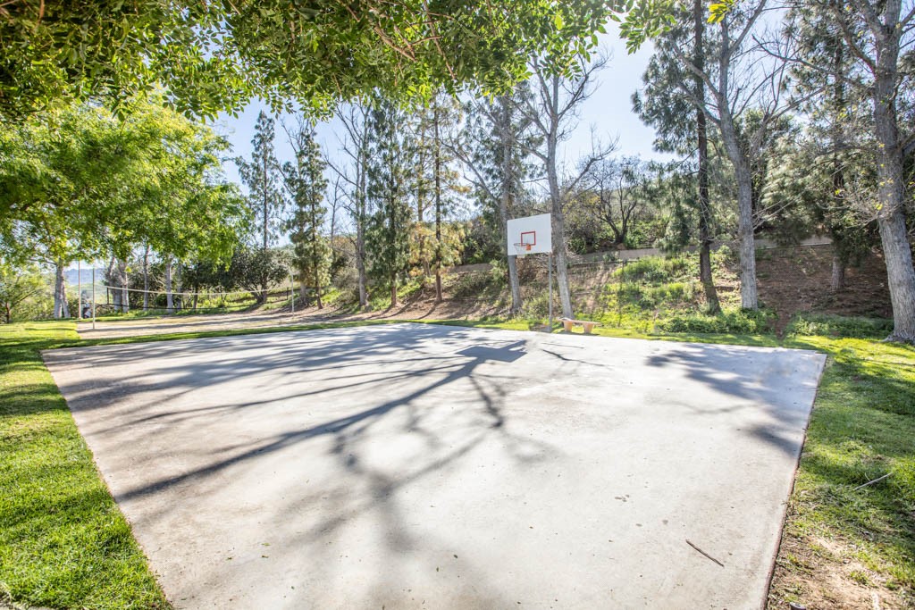 5744 Oak Bend Lane, Unit 203 Oak Park, CA 91377 - Photo 34 of 45 a view of path along with trees
