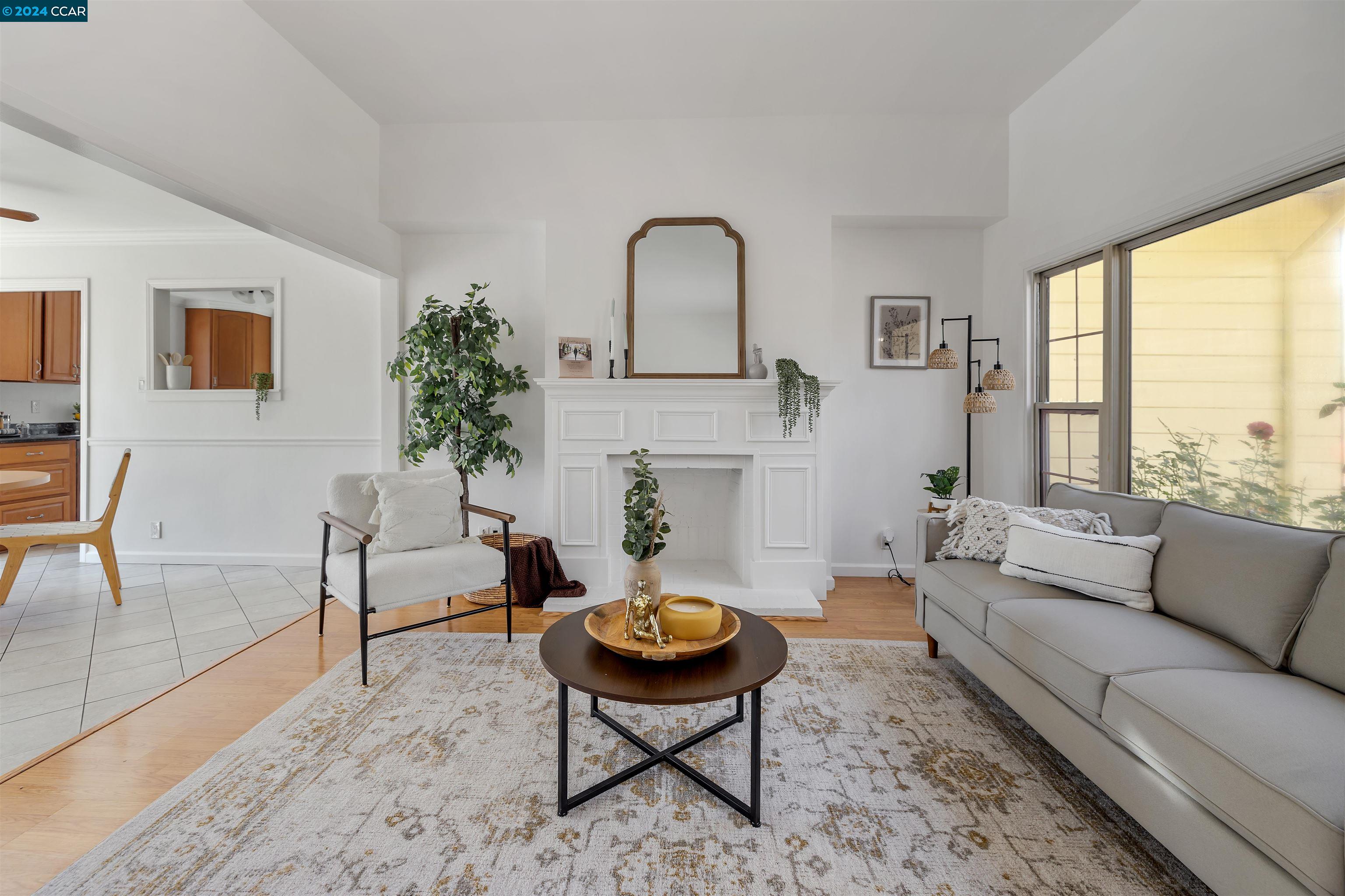 809 Rand Street San Mateo, CA 94401 - Photo 1 of 1 a living room with furniture and a fireplace