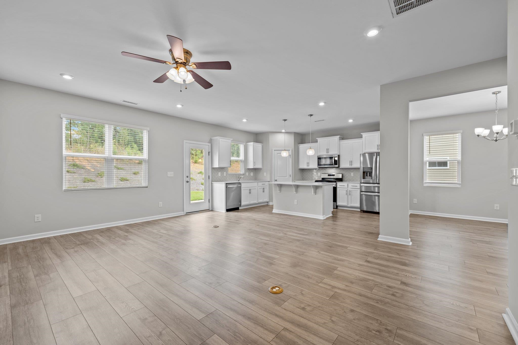 91 Stromness Path Clayton, NC 27527 - Photo 14 of 48 a view of kitchen with refrigerator and window