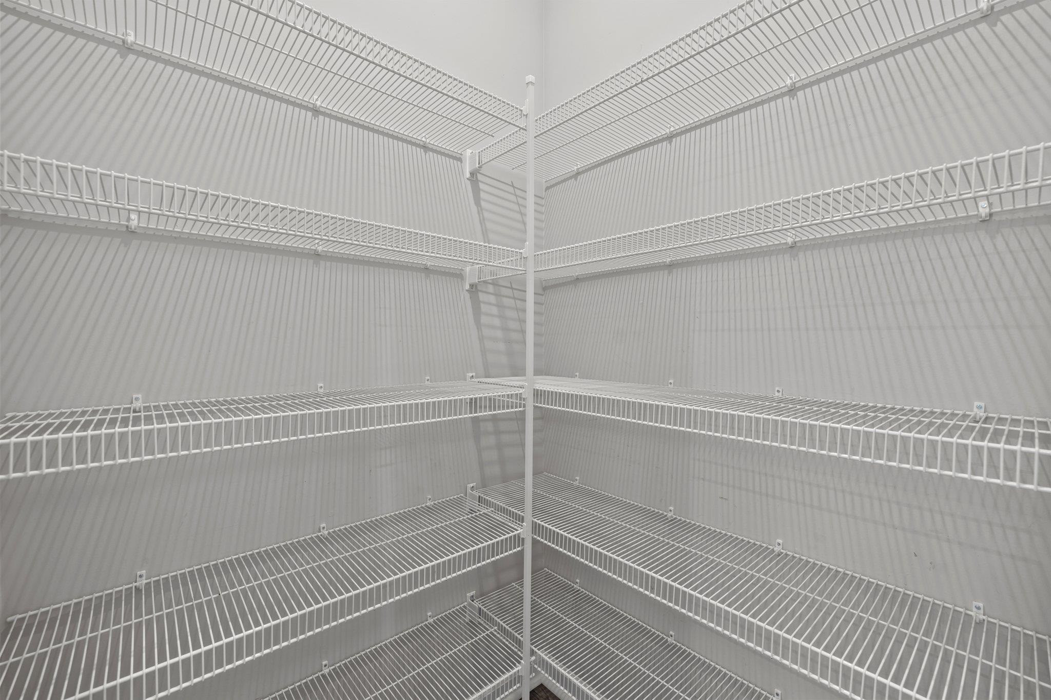 91 Stromness Path Clayton, NC 27527 - Photo 23 of 48 a view of a room with empty racks