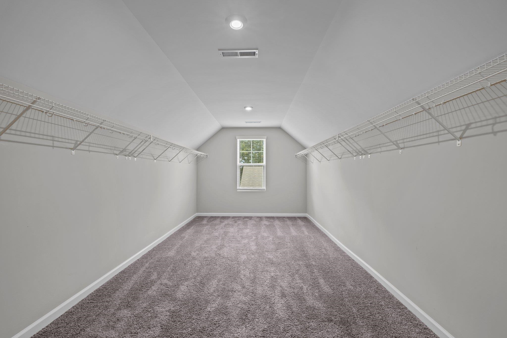 91 Stromness Path Clayton, NC 27527 - Photo 40 of 48 an empty room with windows and windows