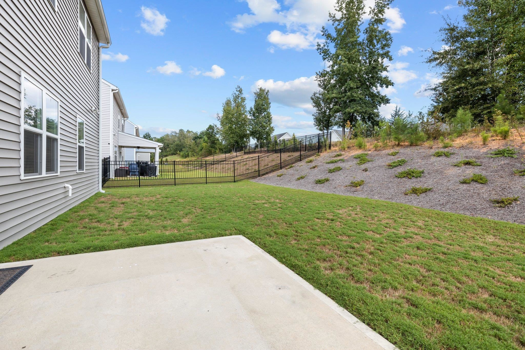 91 Stromness Path Clayton, NC 27527 - Photo 41 of 48 a view of a backyard with green space