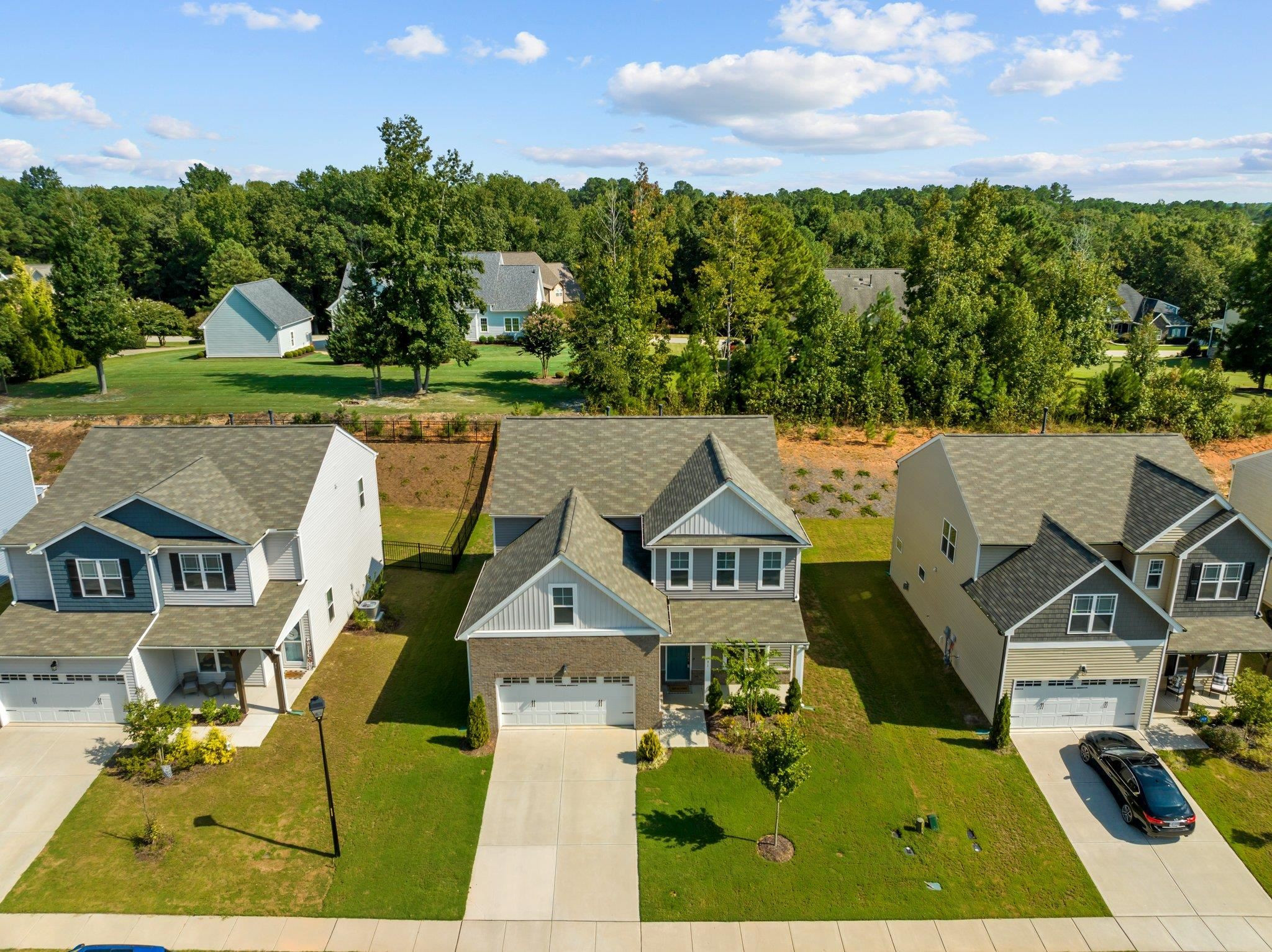 91 Stromness Path Clayton, NC 27527 - Photo 48 of 48 an aerial view of a house with garden