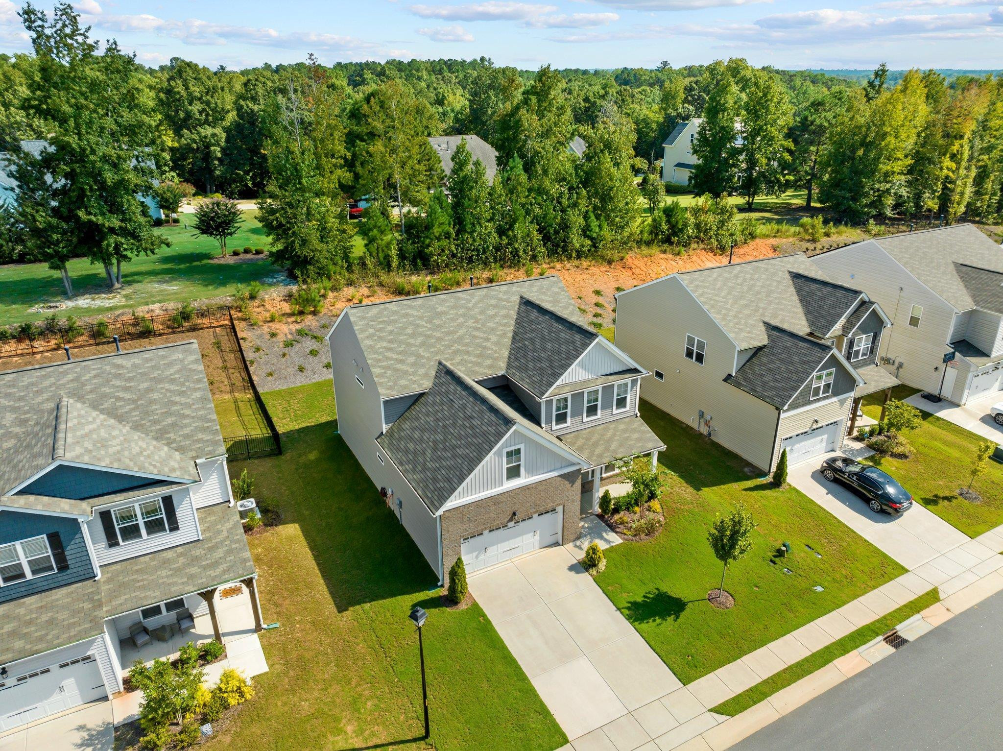 91 Stromness Path Clayton, NC 27527 - Photo 6 of 48 an aerial view of a house with garden space and street view
