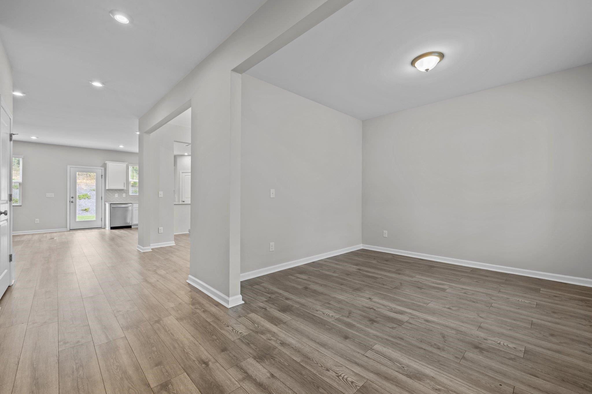 91 Stromness Path Clayton, NC 27527 - Photo 8 of 48 a view of a livingroom with wooden floor