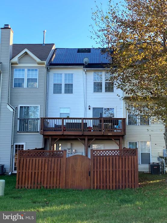 6004 Cedar Post Drive District Heights, MD 20747 - Photo 28 of 28 a view of a house with wooden fence and a bench