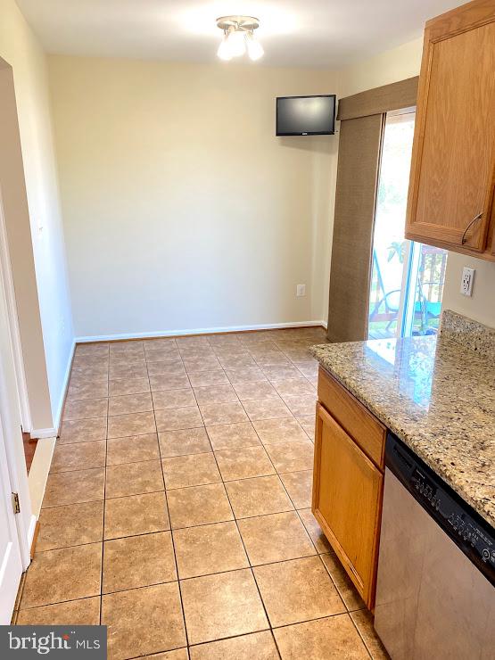 6004 Cedar Post Drive District Heights, MD 20747 - Photo 5 of 28 a bathroom with a granite countertop sink and a mirror