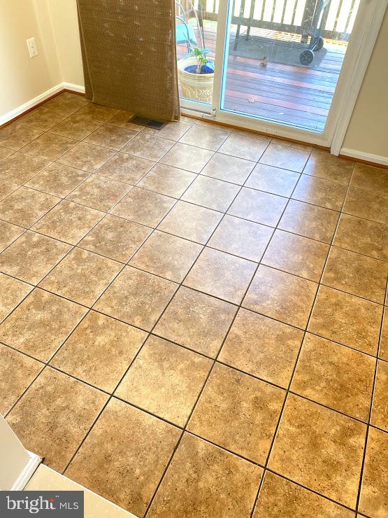 6004 Cedar Post Drive District Heights, MD 20747 - Photo 6 of 28 a view of a wooden floor with a window