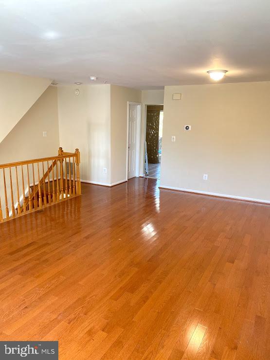 6004 Cedar Post Drive District Heights, MD 20747 - Photo 7 of 28 a view of an empty room with wooden floor