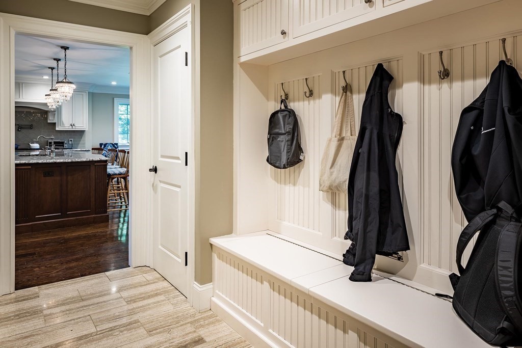 132 Hammond Street Newton, MA 02467 - Photo 14 of 17 a view of walk in closet with clothes and shoes