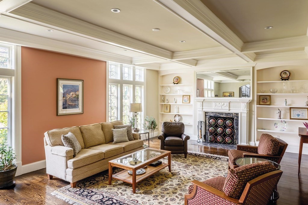 132 Hammond Street Newton, MA 02467 - Photo 2 of 17 a living room with furniture a fireplace and a window