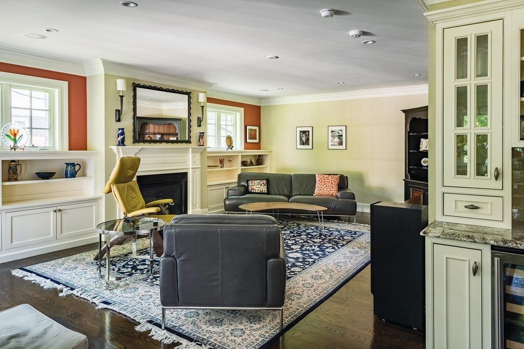 132 Hammond Street Newton, MA 02467 - Photo 8 of 17 a living room with furniture and a fireplace