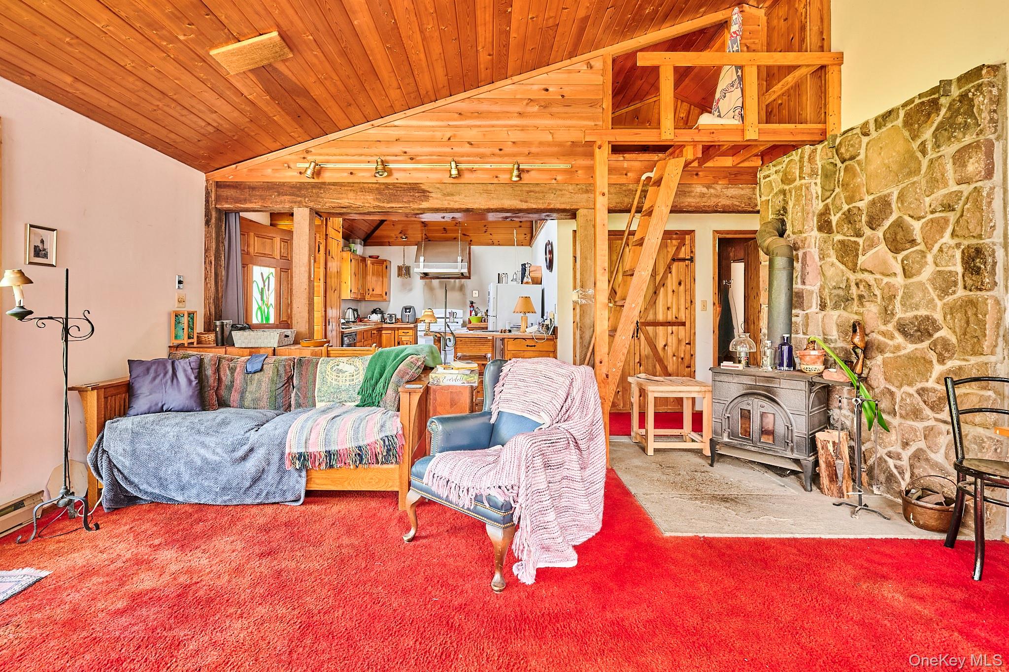 178 Aden Road Liberty, NY 12754 - Photo 14 of 27 a living room filled with furniture and a table
