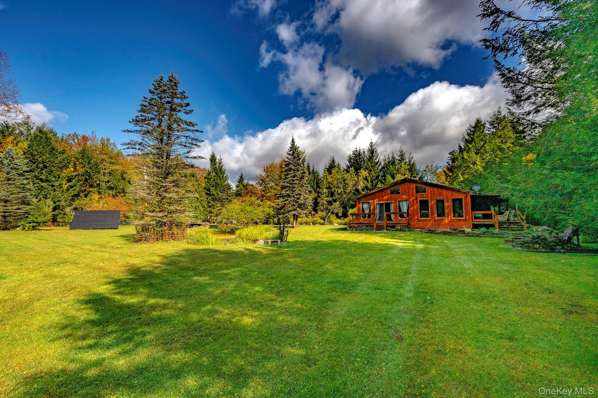 178 Aden Road Liberty, NY 12754 - Photo 23 of 27 a view of a fountain in front of the house