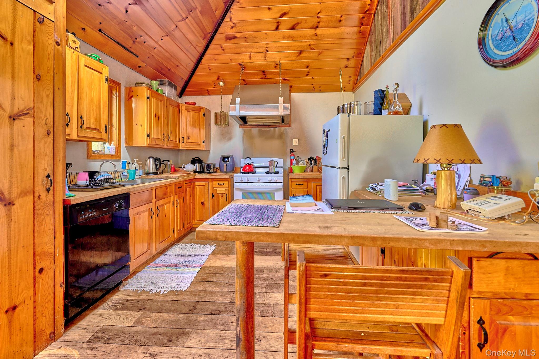 178 Aden Road Liberty, NY 12754 - Photo 6 of 27 a dining hall with stainless steel appliances granite countertop a stove and a refrigerator