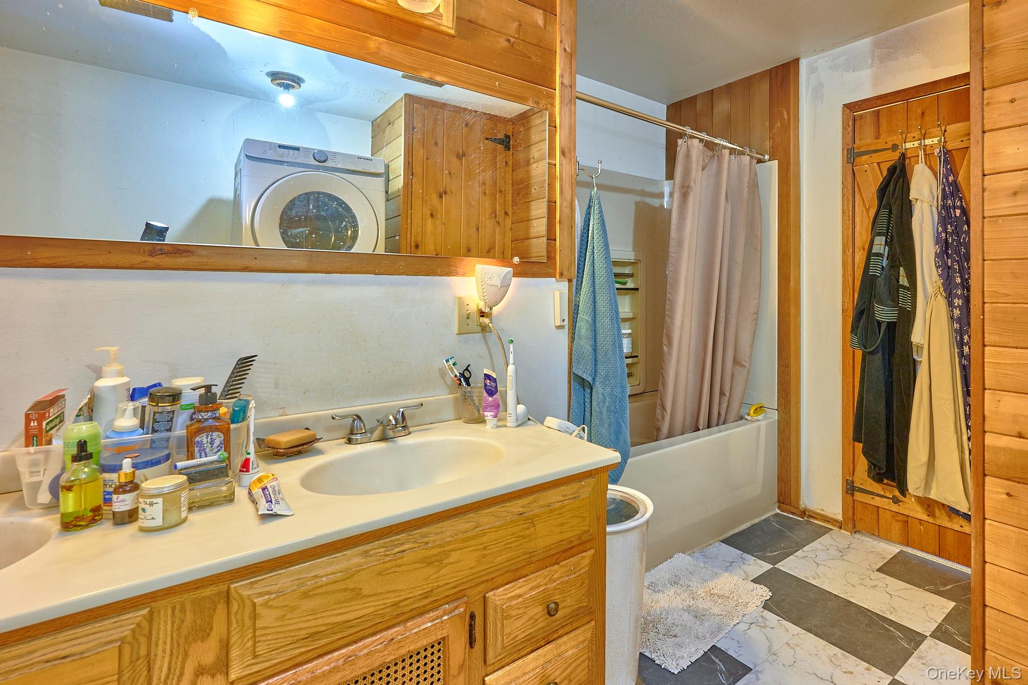 178 Aden Road Liberty, NY 12754 - Photo 7 of 27 a bathroom with a sink mirror and shower