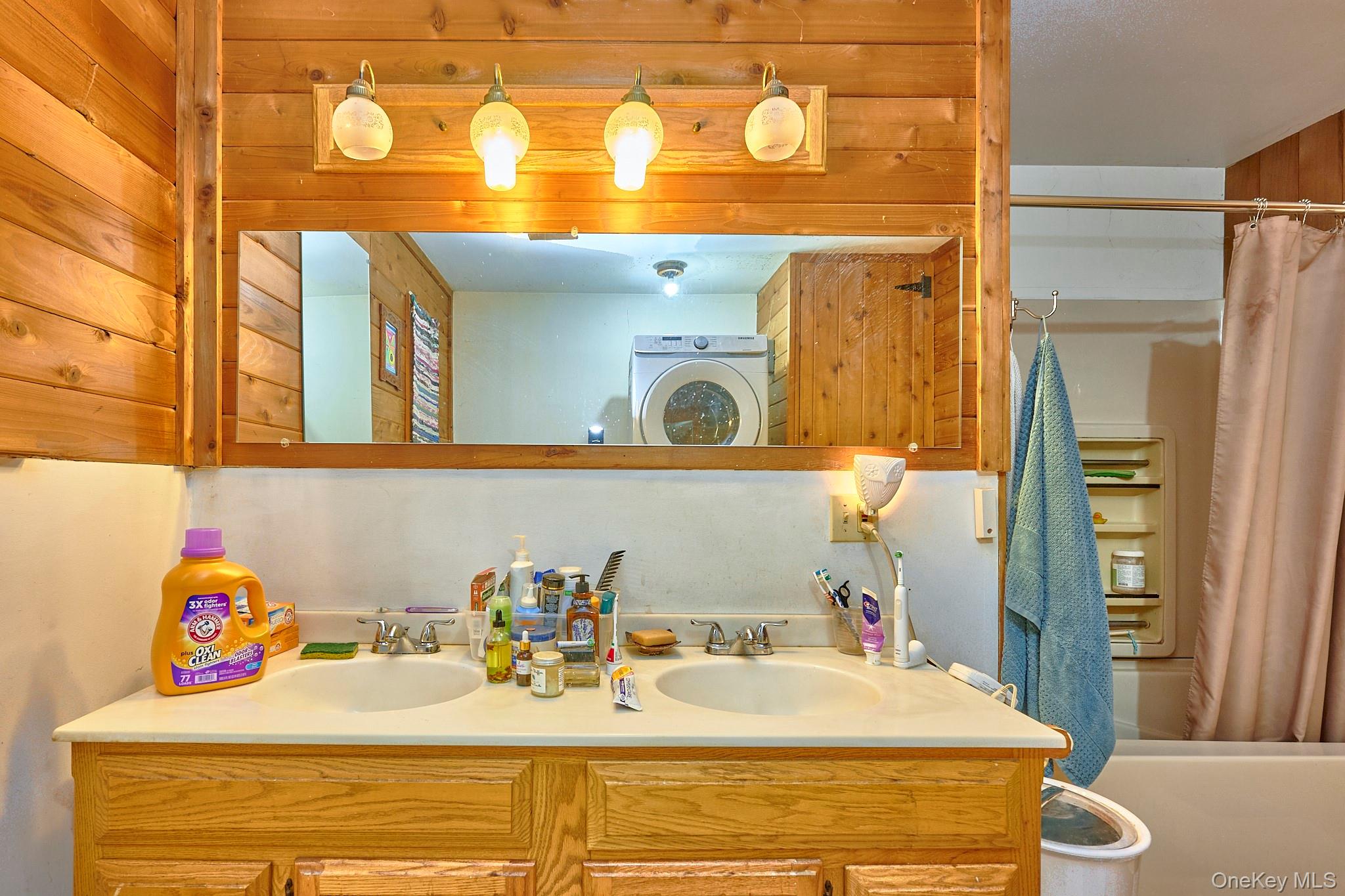 178 Aden Road Liberty, NY 12754 - Photo 8 of 27 a bathroom with a sink and a mirror