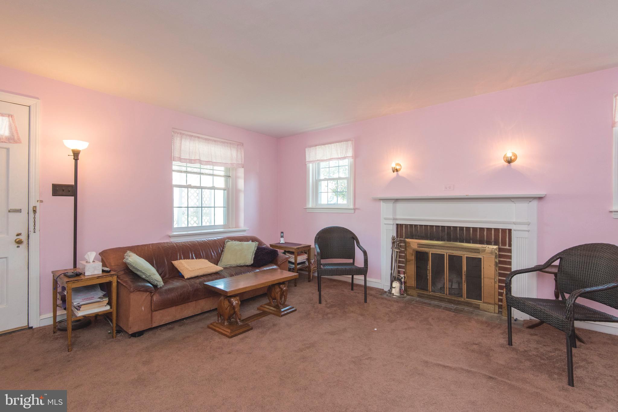 9 Fairfield Road Havertown, PA 19083 - Photo 11 of 31 a living room with furniture and a fireplace
