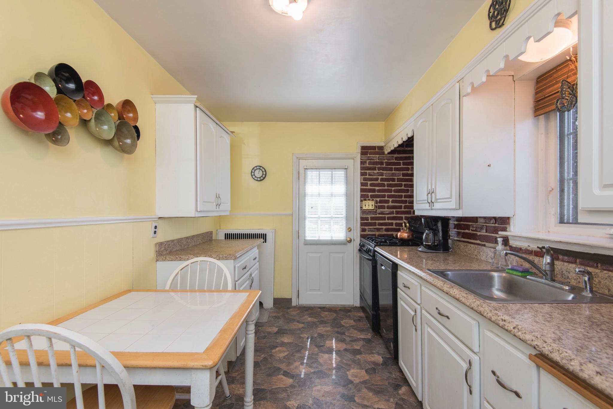9 Fairfield Road Havertown, PA 19083 - Photo 15 of 31 a kitchen that has a sink and a stove in it