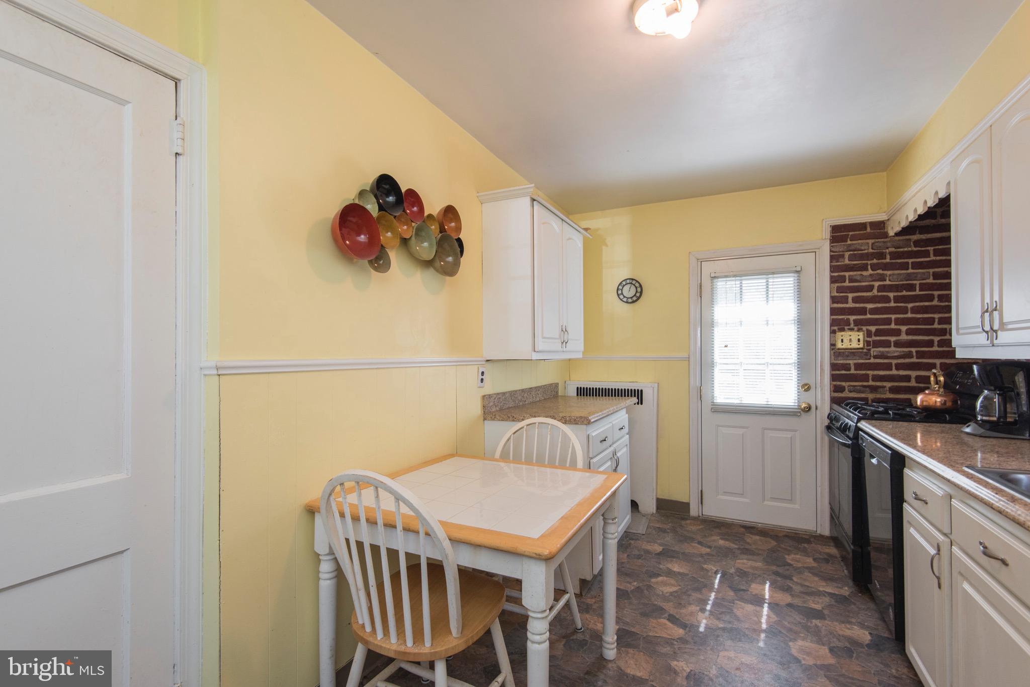 9 Fairfield Road Havertown, PA 19083 - Photo 16 of 31 a bedroom with a bed and a table in it