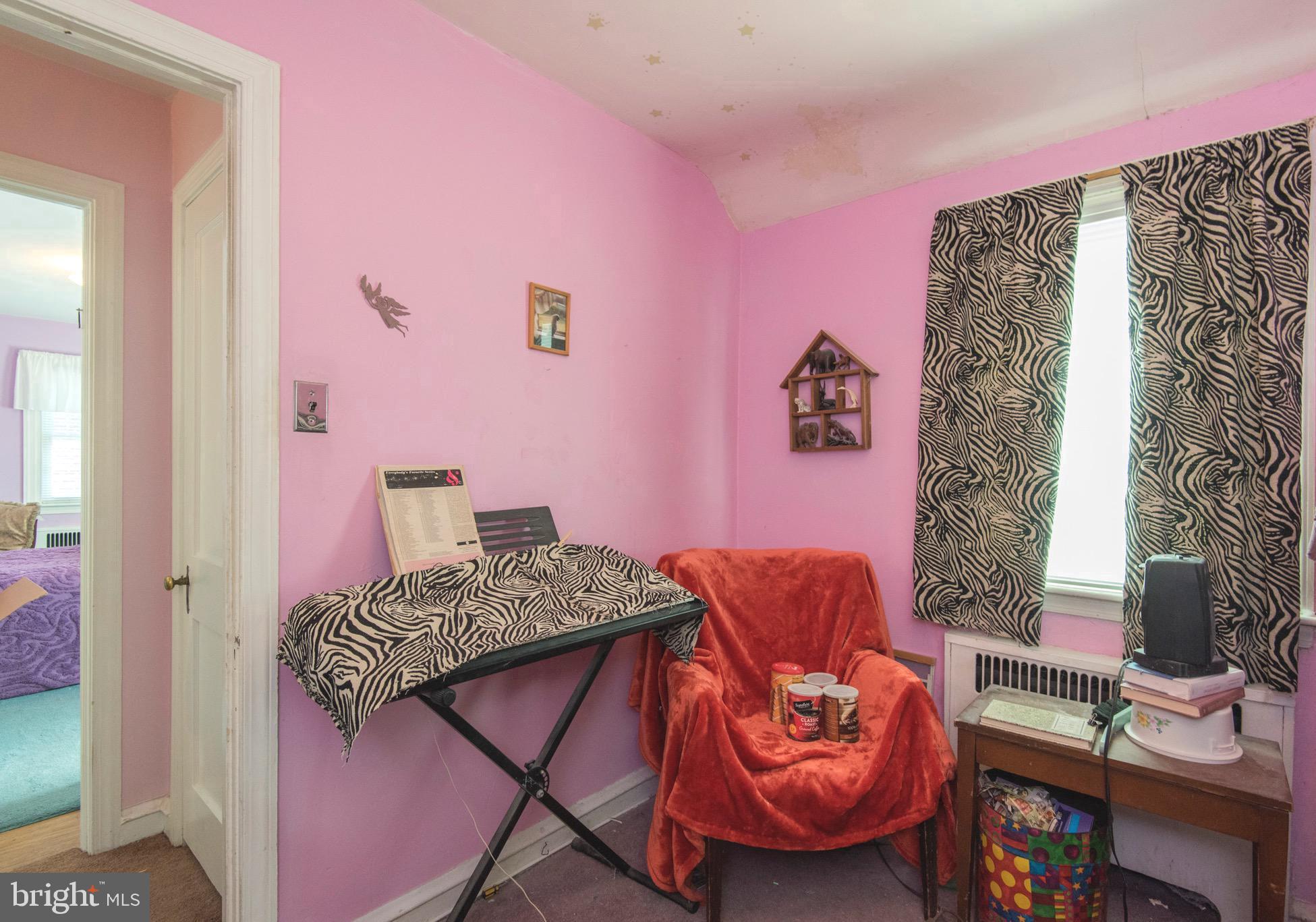 9 Fairfield Road Havertown, PA 19083 - Photo 27 of 31 a bedroom with a bed and a chair