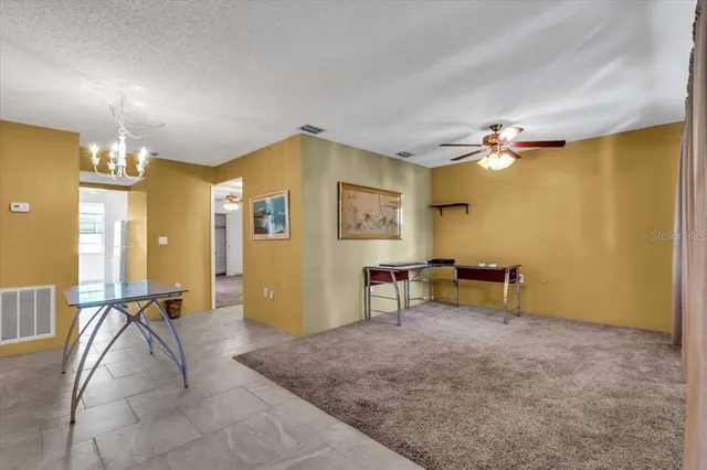 a view of a livingroom with furniture