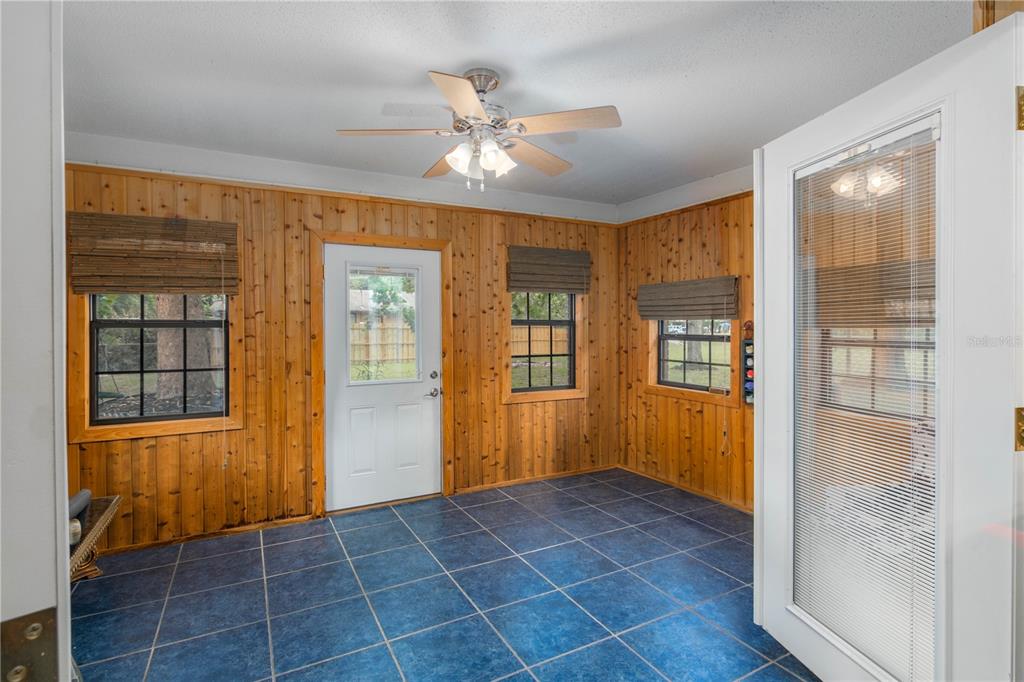 126 Southwest Mockingbird Way Lake City, FL 32024 - Photo 30 of 37 a view of an entryway with wooden floor and a livingroom
