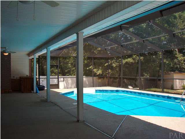 1436 Kings Road Cantonment, FL 32533 - Photo 15 of 21 Has wet bar & 1/2 bath by pool