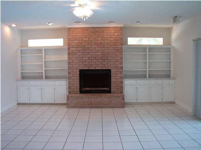 1436 Kings Road Cantonment, FL 32533 - Photo 6 of 21 Great room with fire place & built in book shelves