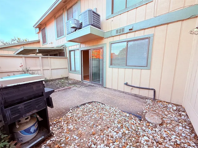 a garden view with a seating space