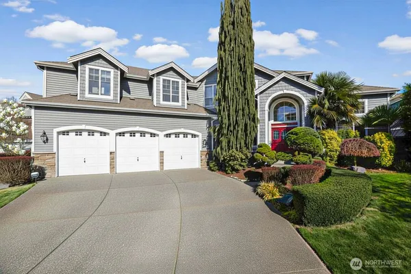 a view of a house with a garden