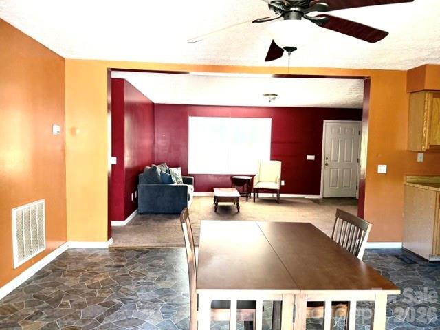 4084 Carpenters Cove Road Claremont, NC 28610 - Photo 14 of 27 a living room with furniture