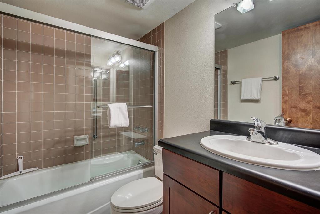 800 Copper Road, Unit 104 Copper Mountain, CO 80443 - Photo 19 of 32 a bathroom with a sink toilet and shower