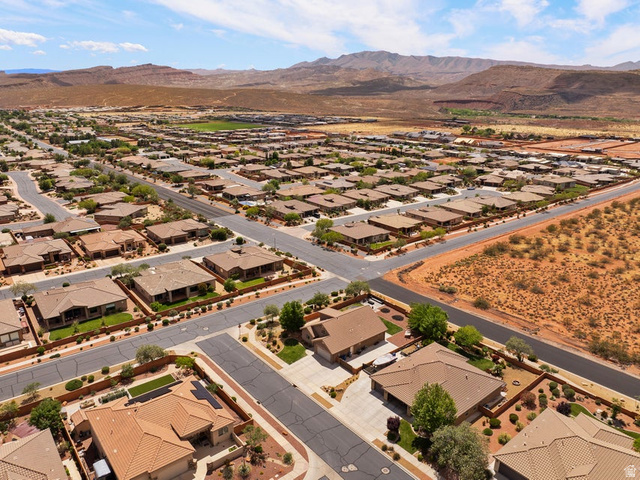 225 Falcon Court Ivins, UT 84738 - Photo 36 of 47 Aerial view of residential area with a mountainous background