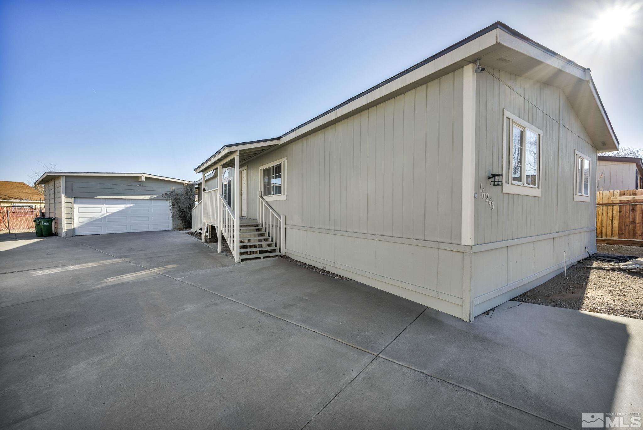 16245 Autunite Circle Reno, NV 89521 - Photo 2 of 37 a view of a house with a garage