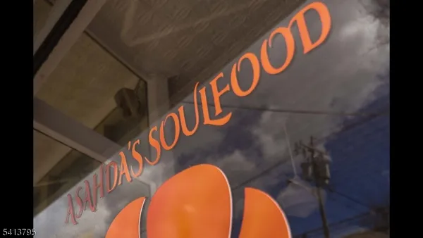 a view of a chairs and tables in patio of a house