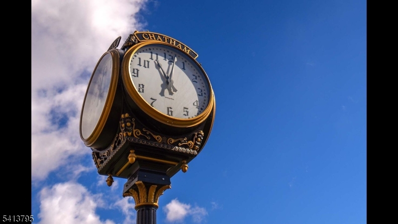 500 Main Street, Unit 3D Chatham, NJ 07928 - Photo 8 of 15 a view of stairs with wooden floor