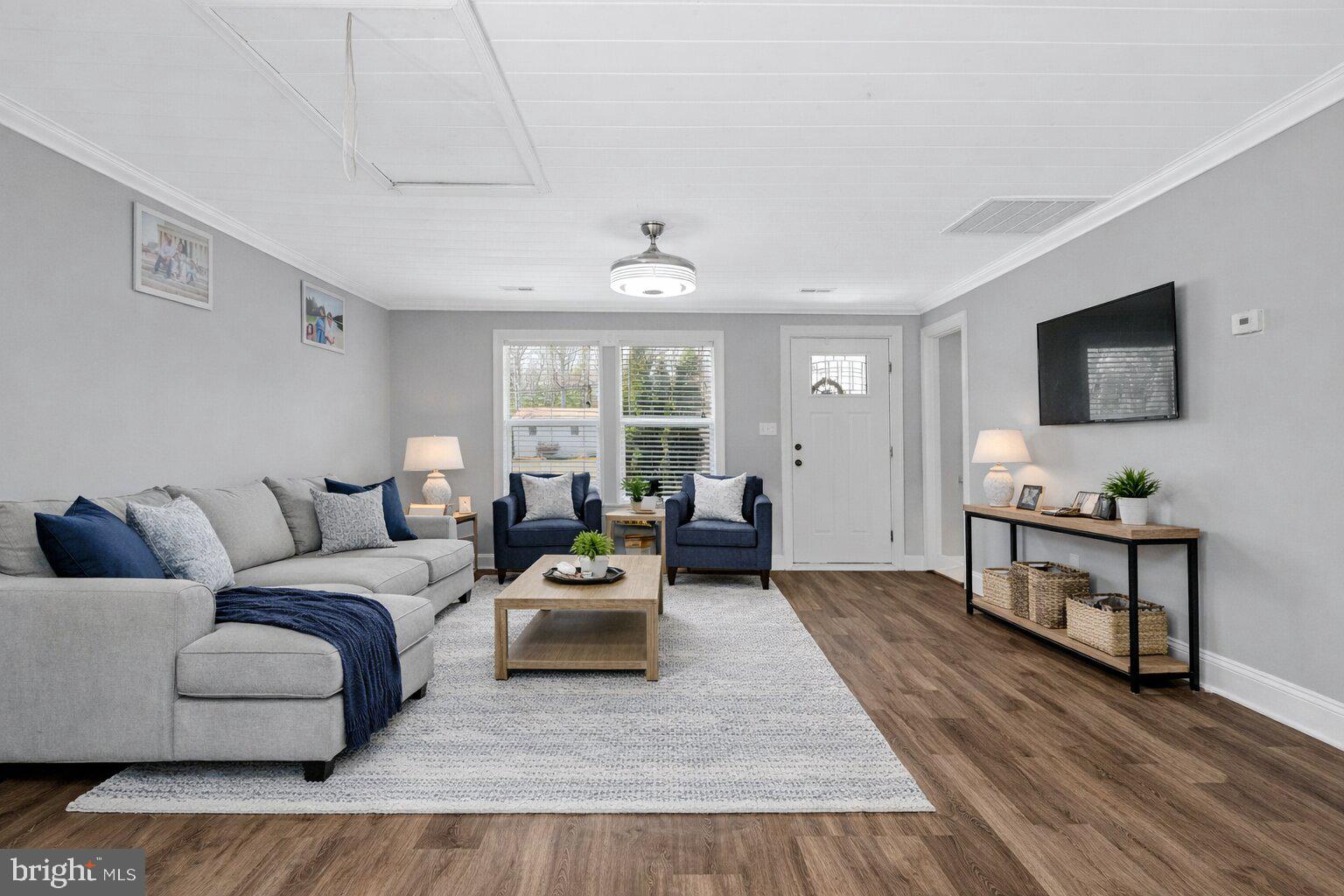 4103 Port Tobacco Road Nanjemoy, MD 20662 - Photo 3 of 19 a living room with furniture and a flat screen tv