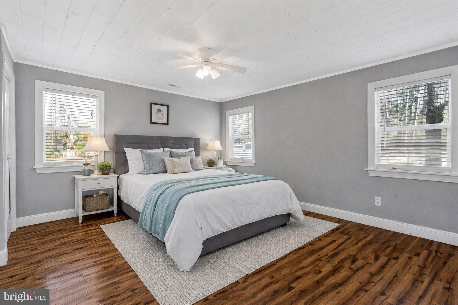 4103 Port Tobacco Road Nanjemoy, MD 20662 - Photo 8 of 19 a bedroom with a bed and wooden floor
