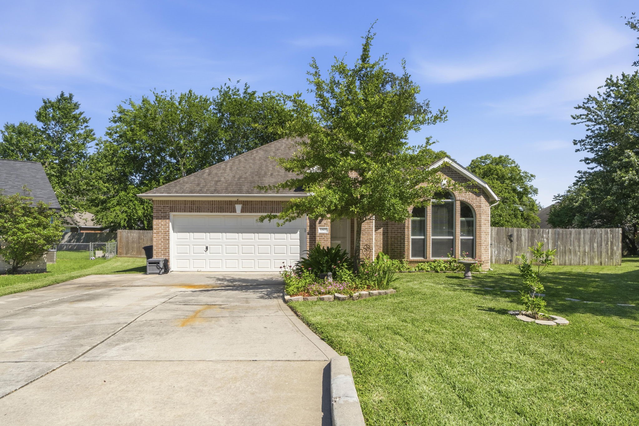 10802 Windswept Montgomery, TX 77356 - Photo 40 of 42 a house view with a garden space