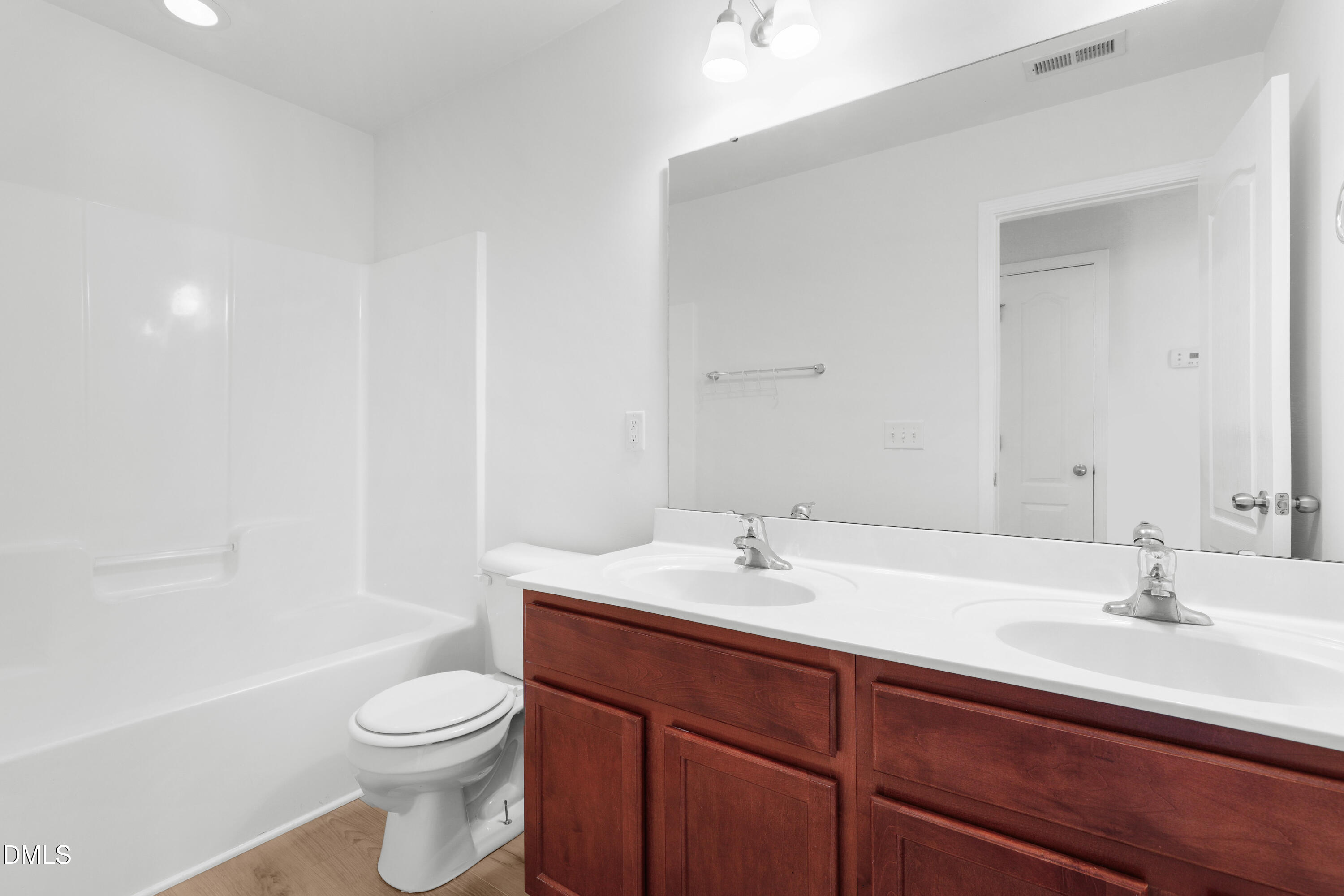 4400 Hillsgrove Road Wake Forest, NC 27587 - Photo 28 of 49 a bathroom with a sink and a toilet